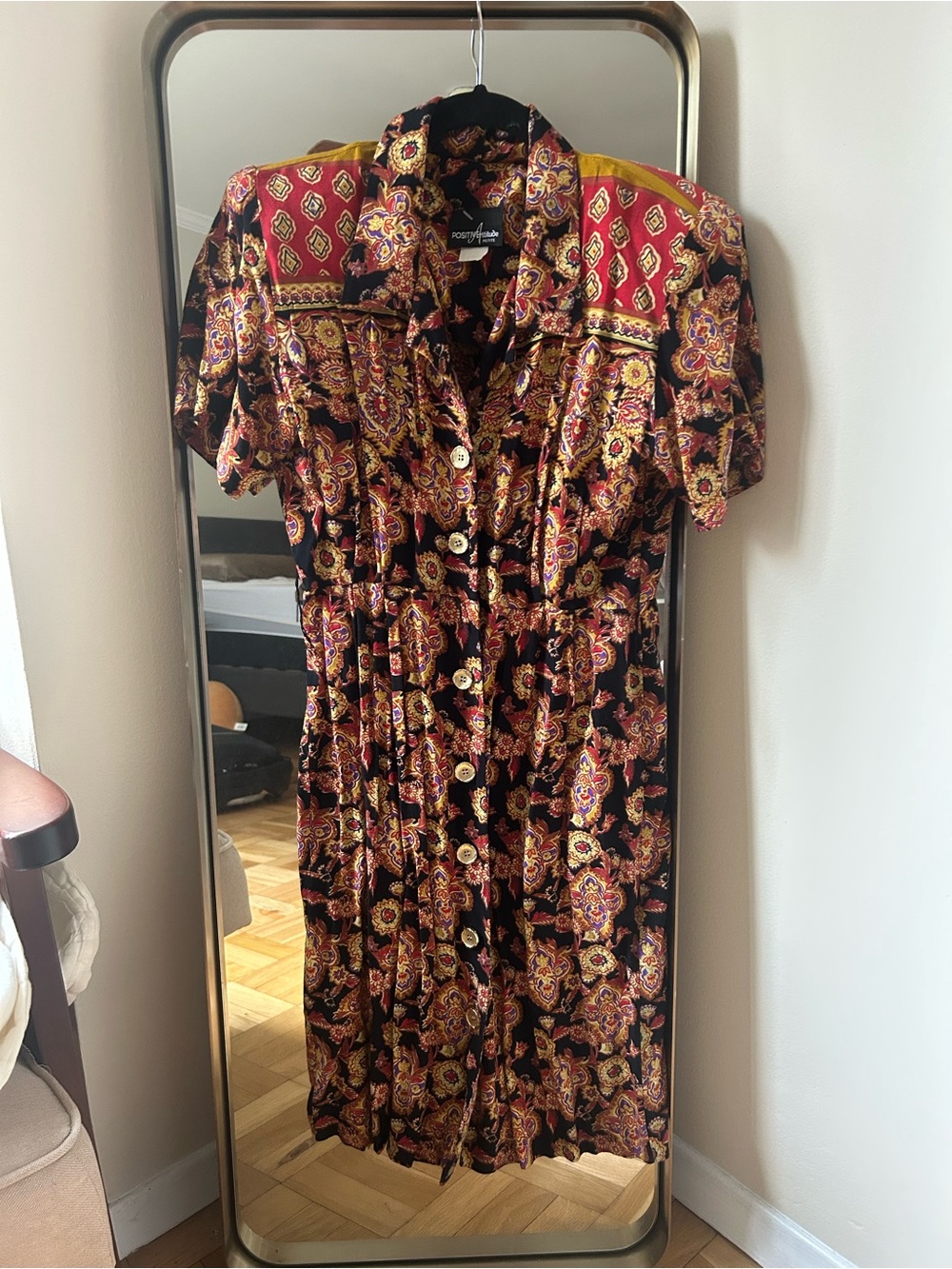 Positive Attitude Black Dress with Red and Gold Paisley Print